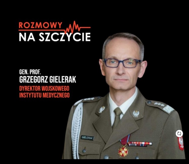 Zdjęcie Grzegorza Gieleraka. Polewej stronie napis 