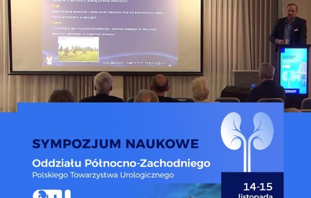 Widok z tyłu sali na wykład, logo konferencji.