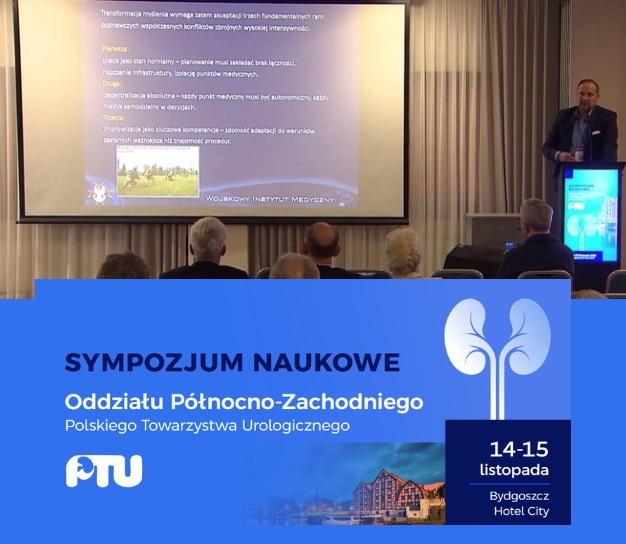 Widok z tyłu sali na wykład, logo konferencji.